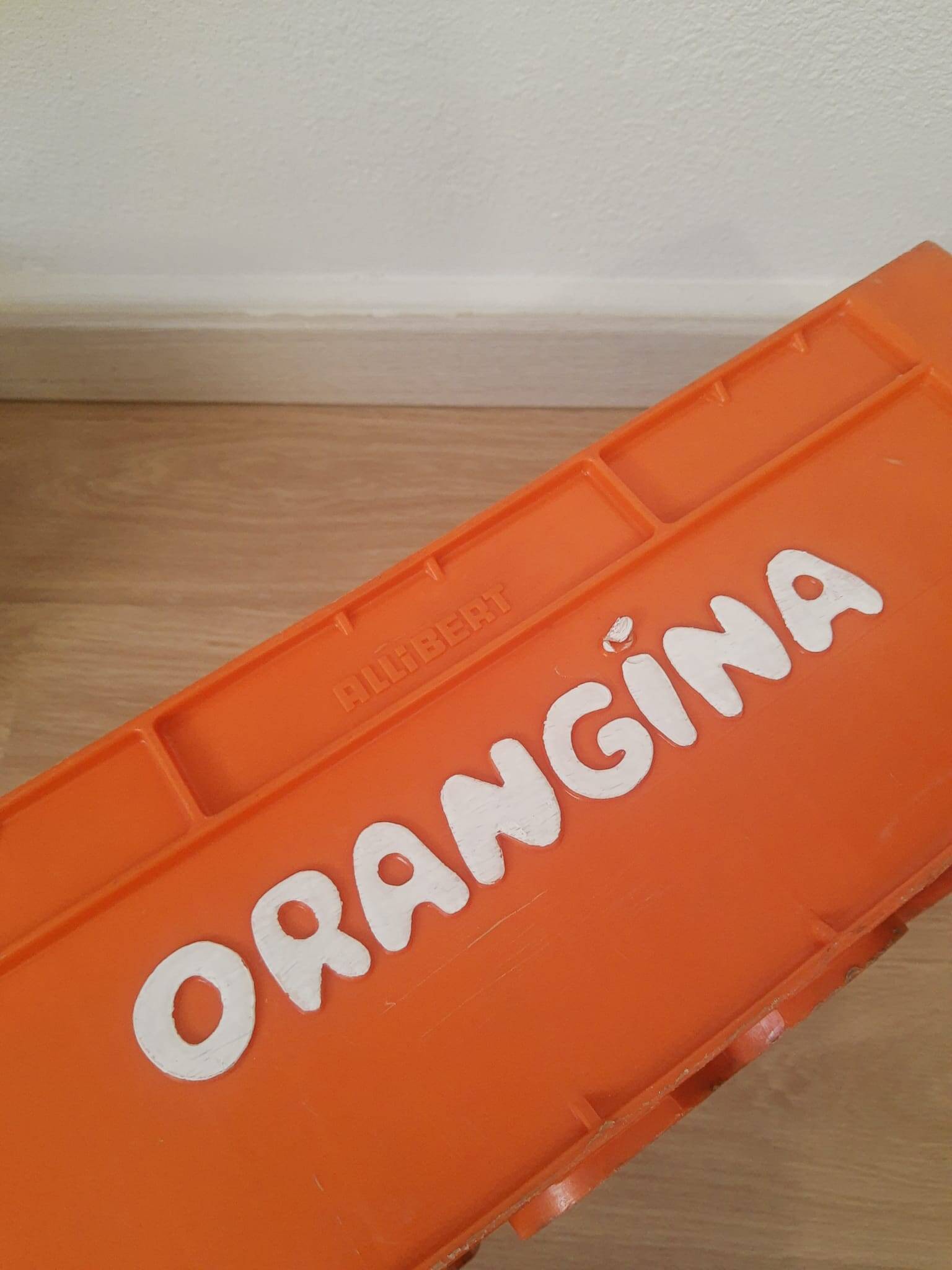 Vintage Orangina advertising bottle crate