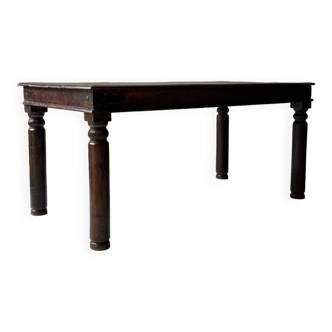 Solid wood dining table.