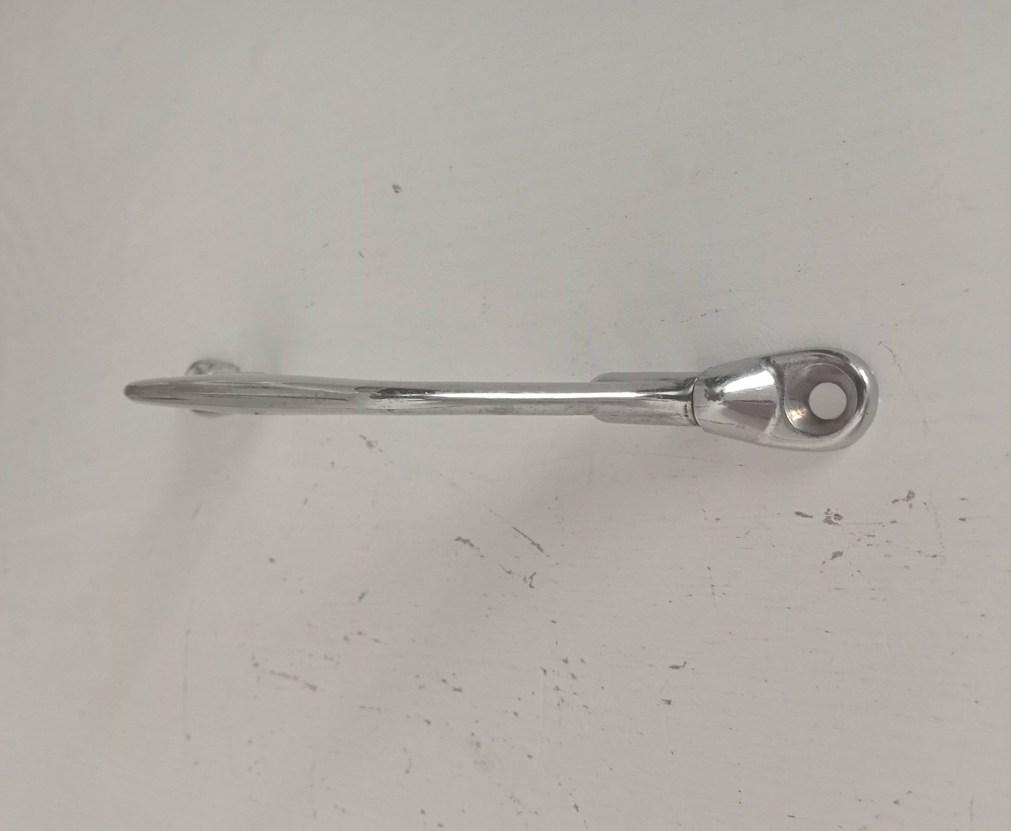 Vintage chrome furniture handle from the 1960s.