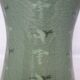 Korean vase in crackled celadon with a pattern of ducks and clouds.