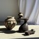 Small brutalist handcrafted terracotta vase with a pedestal, Indonesian, H19 D17.