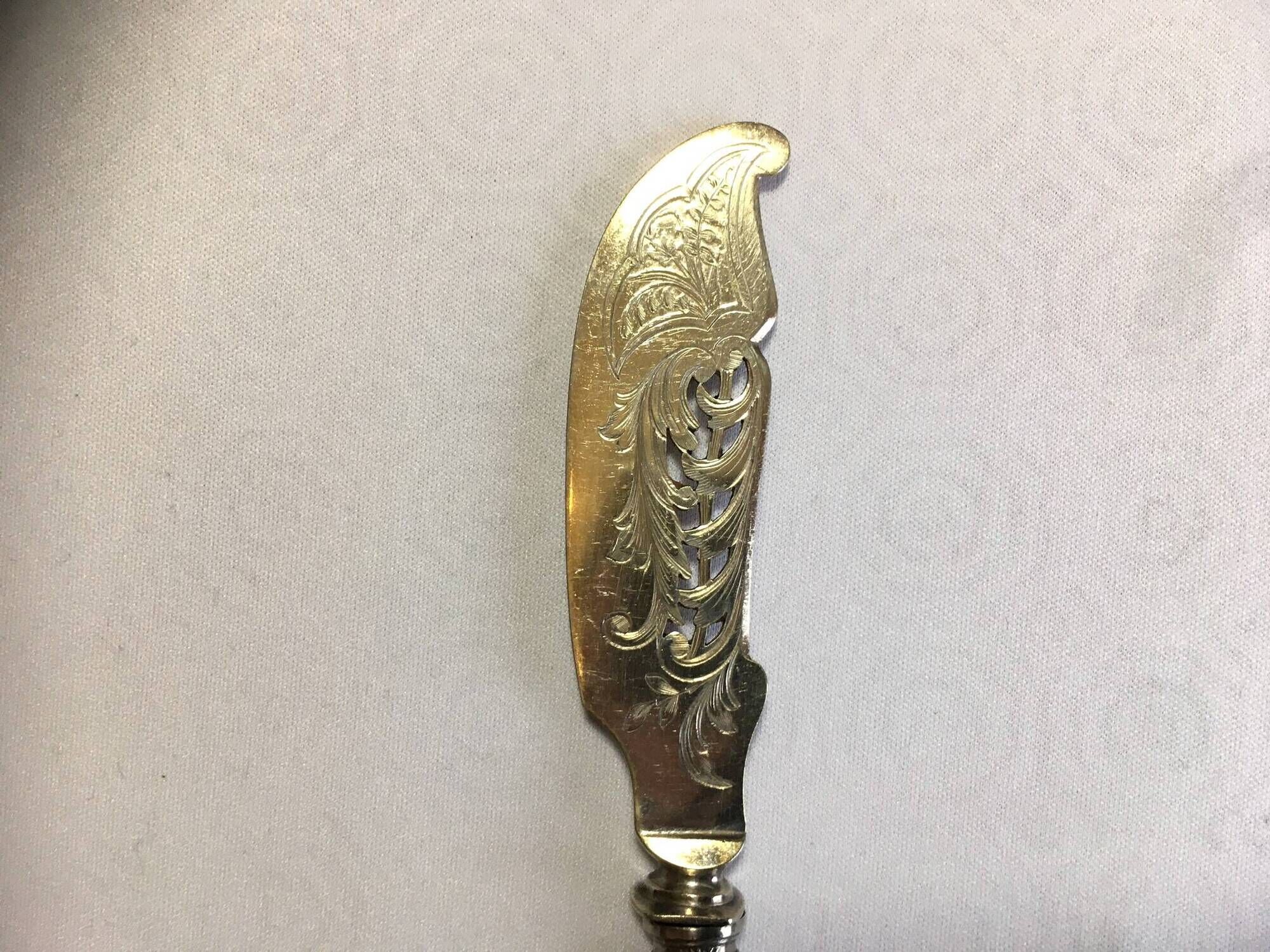 Silver-plated cheese knife with finely chiseled blade, 1900s