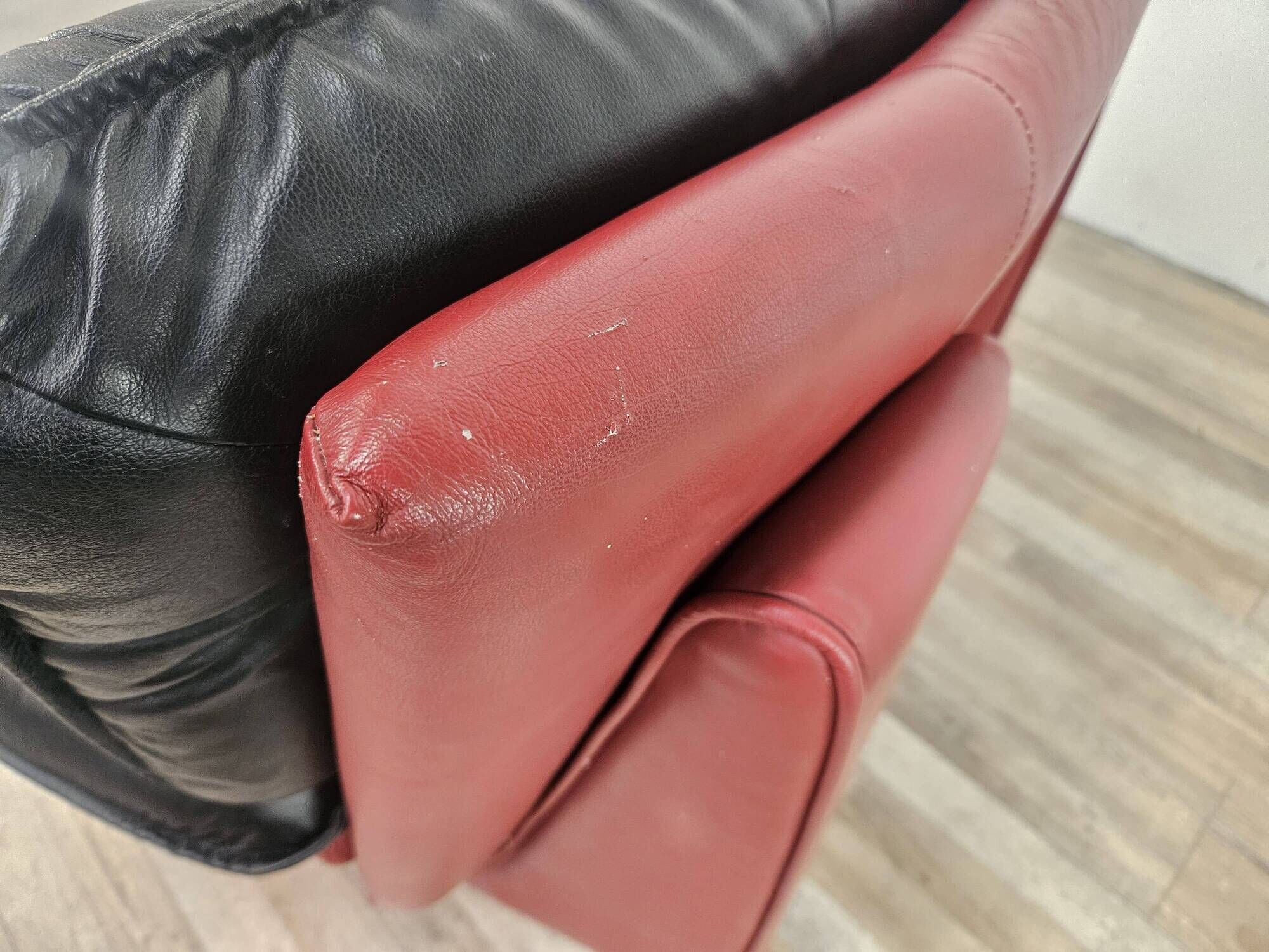 Red and black leather armchair by Nicoletti Salotti