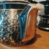 Set of 9 cups and their matching art deco teapot