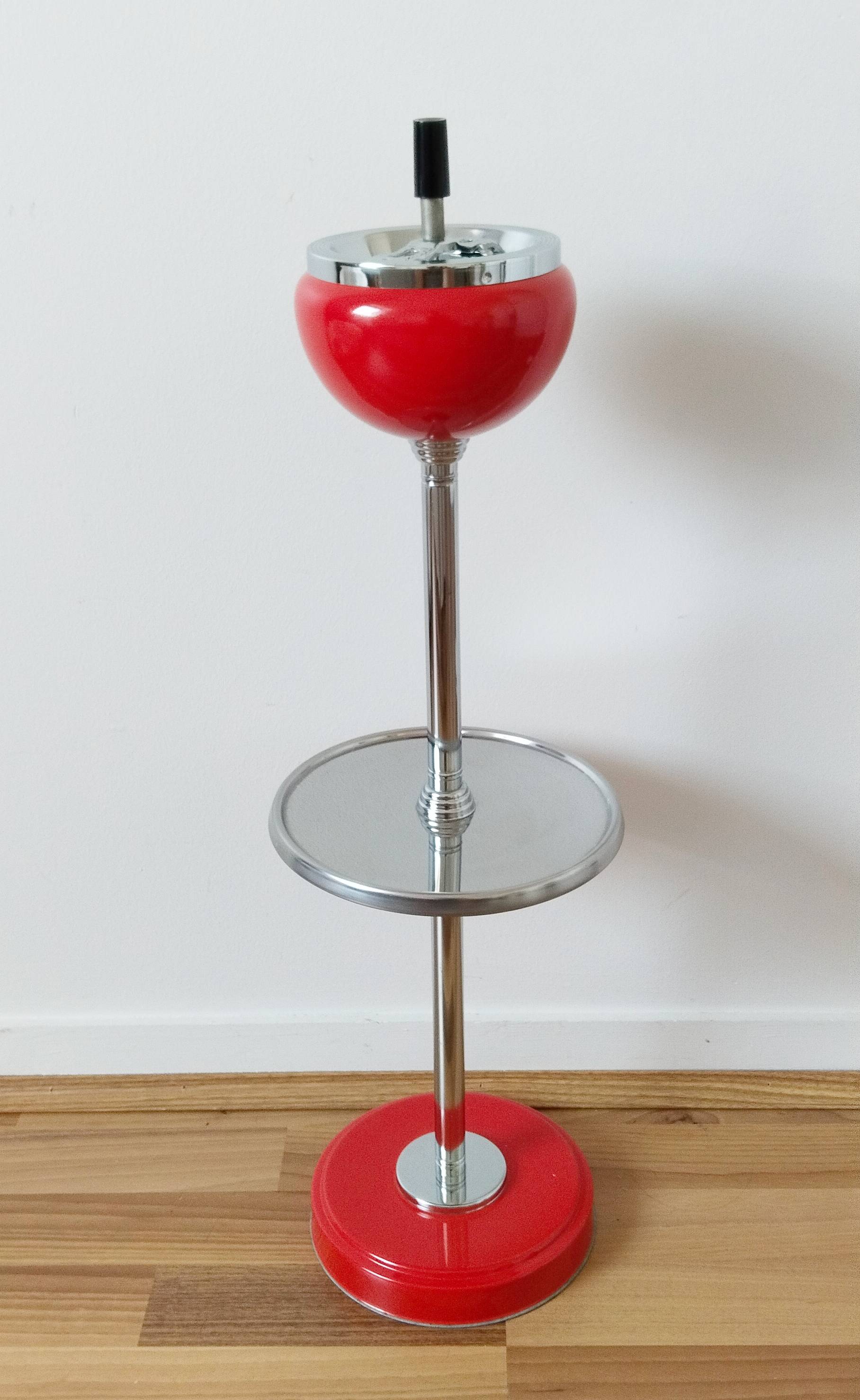Orange standing ashtray with shelf