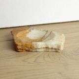 Empty pocket in orange and white marble ashtray