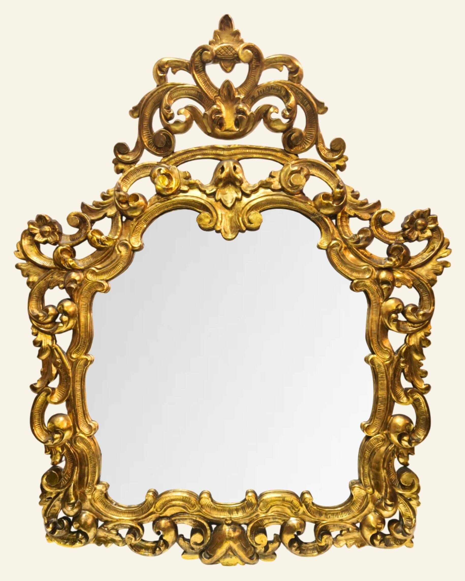 Antique wall mirror in carved and gilded wood, baroque style, 140 × 115 cm
