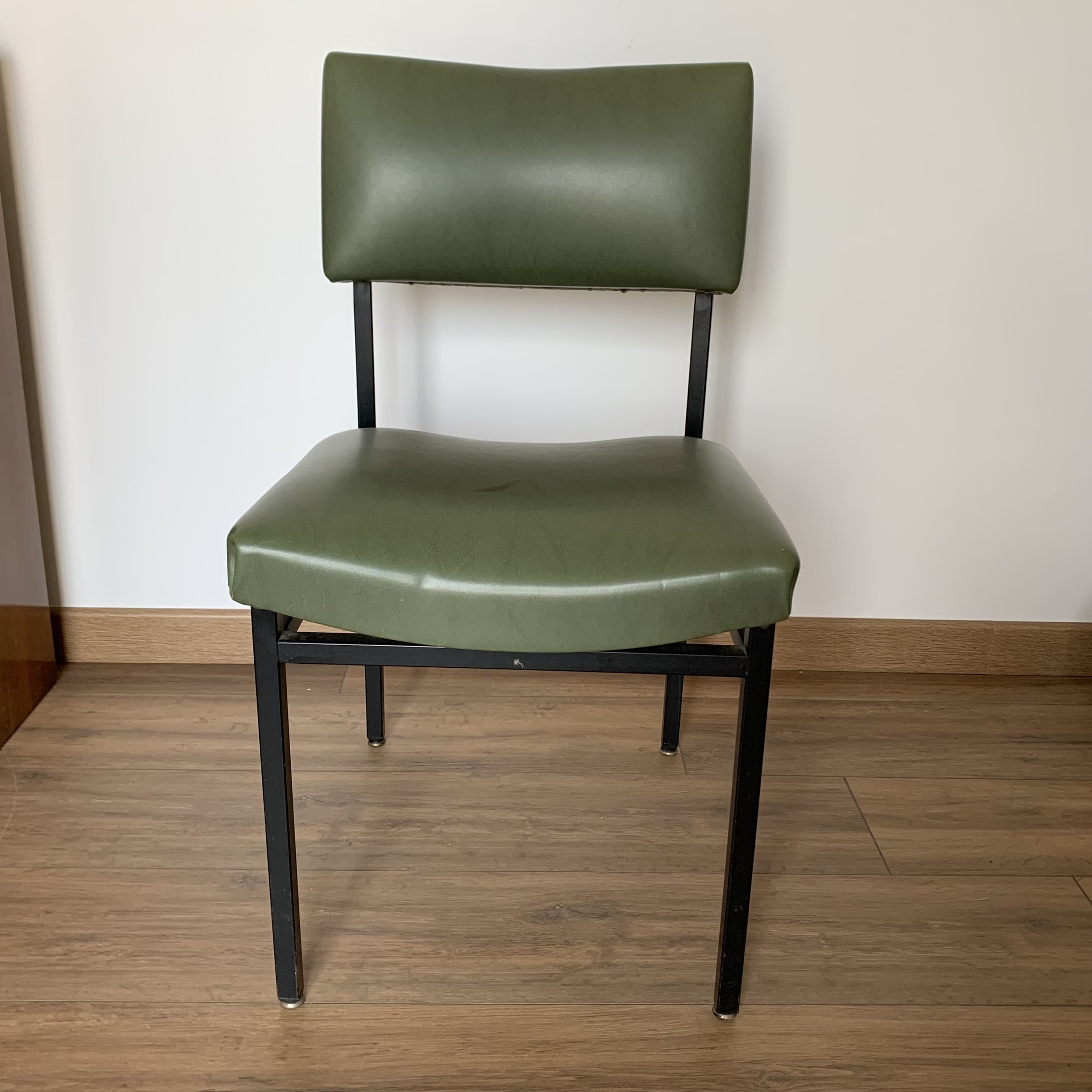 green and metal skai chair