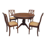Meurisier table with chairs.
