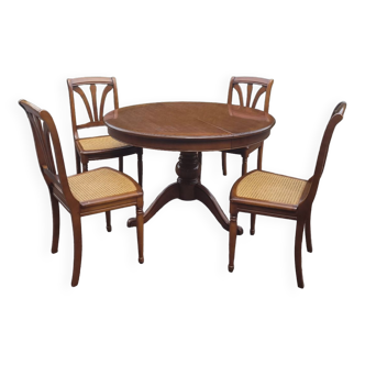 Meurisier table with chairs.