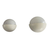 Round wall lights, small and large, in white metal by Bega, 1970s, Germany.