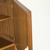 Narrow teak bookcase with two doors by Omann Jun, 1970s