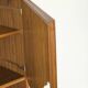 Narrow teak bookcase with two doors by Omann Jun, 1970s