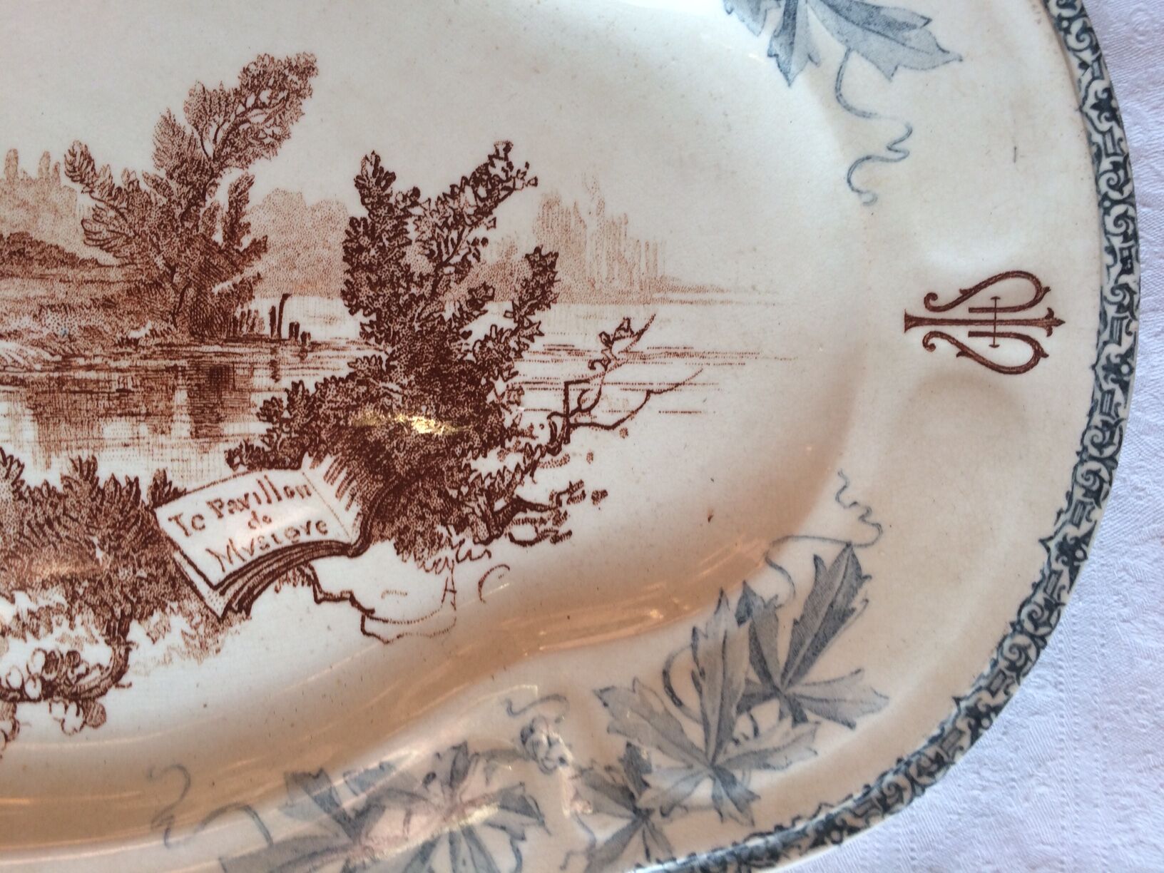 Ancient dish made of earthenware from the factory of Choisy the King
