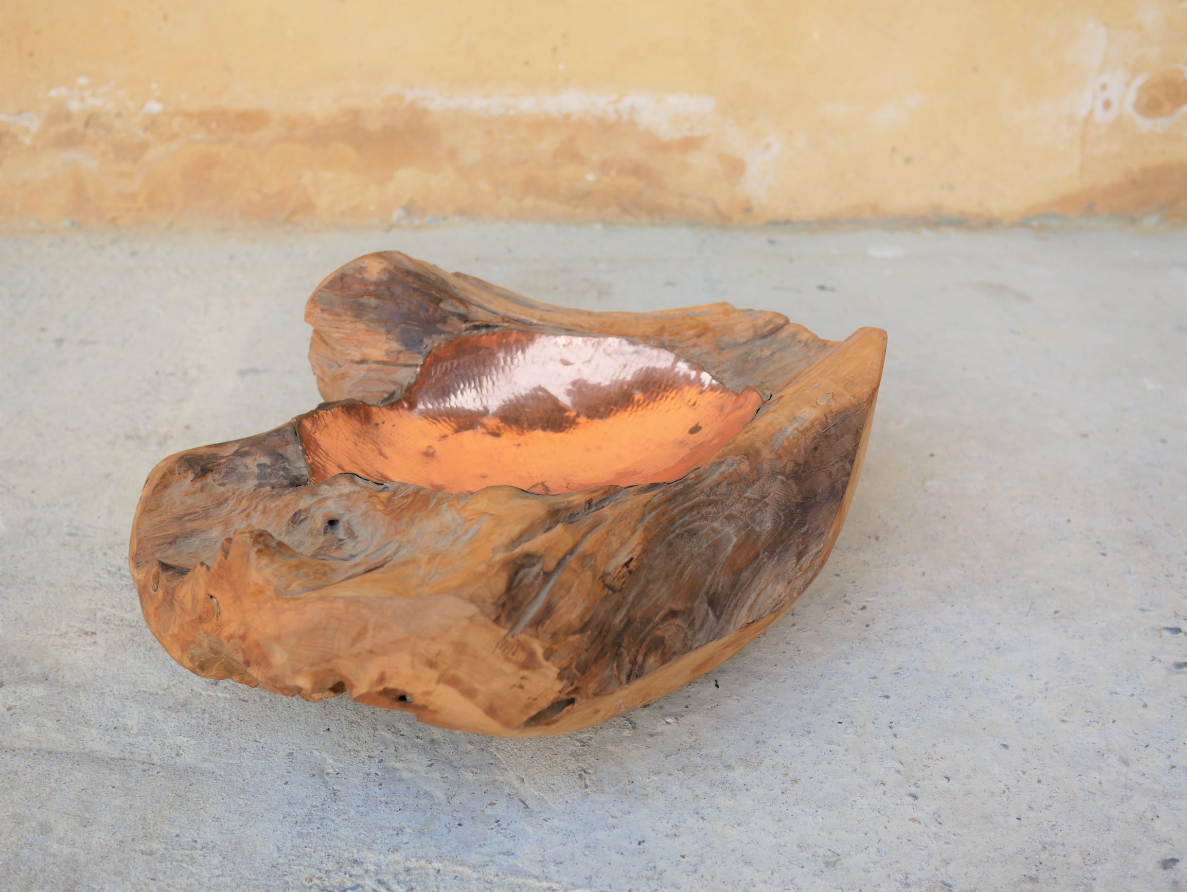 Empty wooden and copper pocket