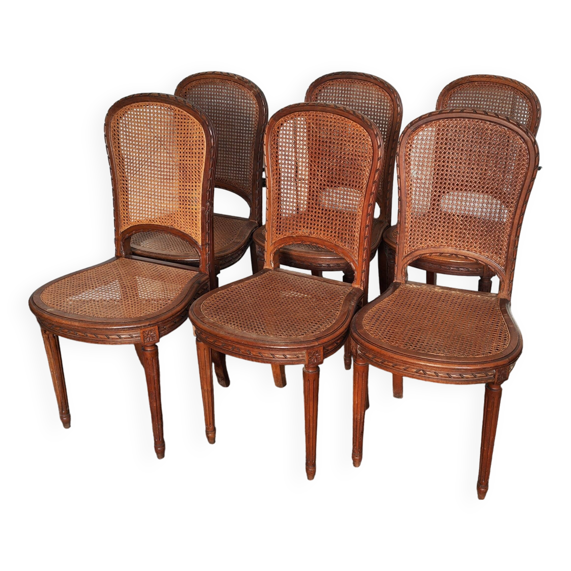 Set of six louis xvi style caned chairs