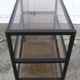 Rolling table serves 3 trays of smoked glass