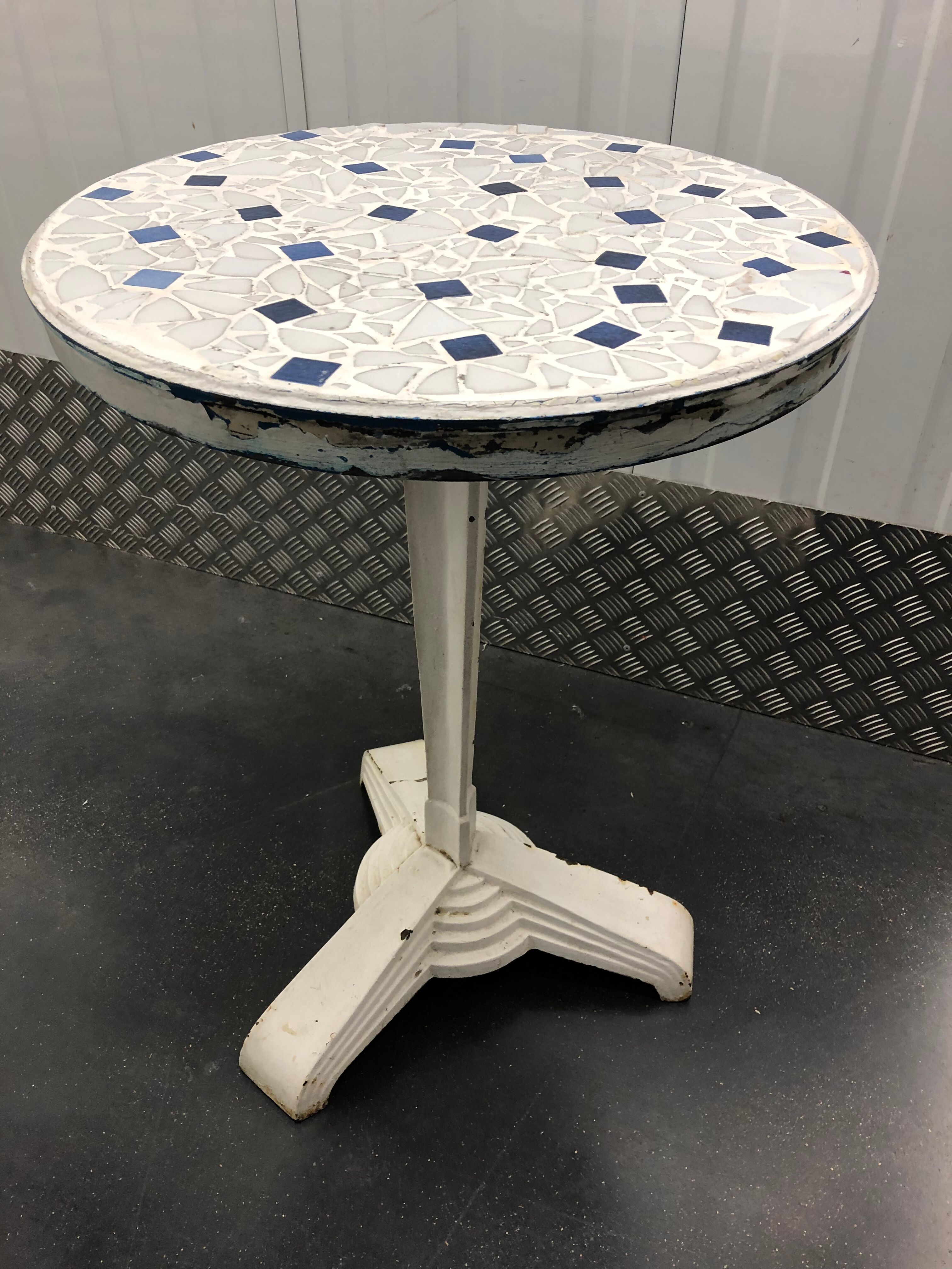 Art Deco cast garden table and porcelain shard tray
