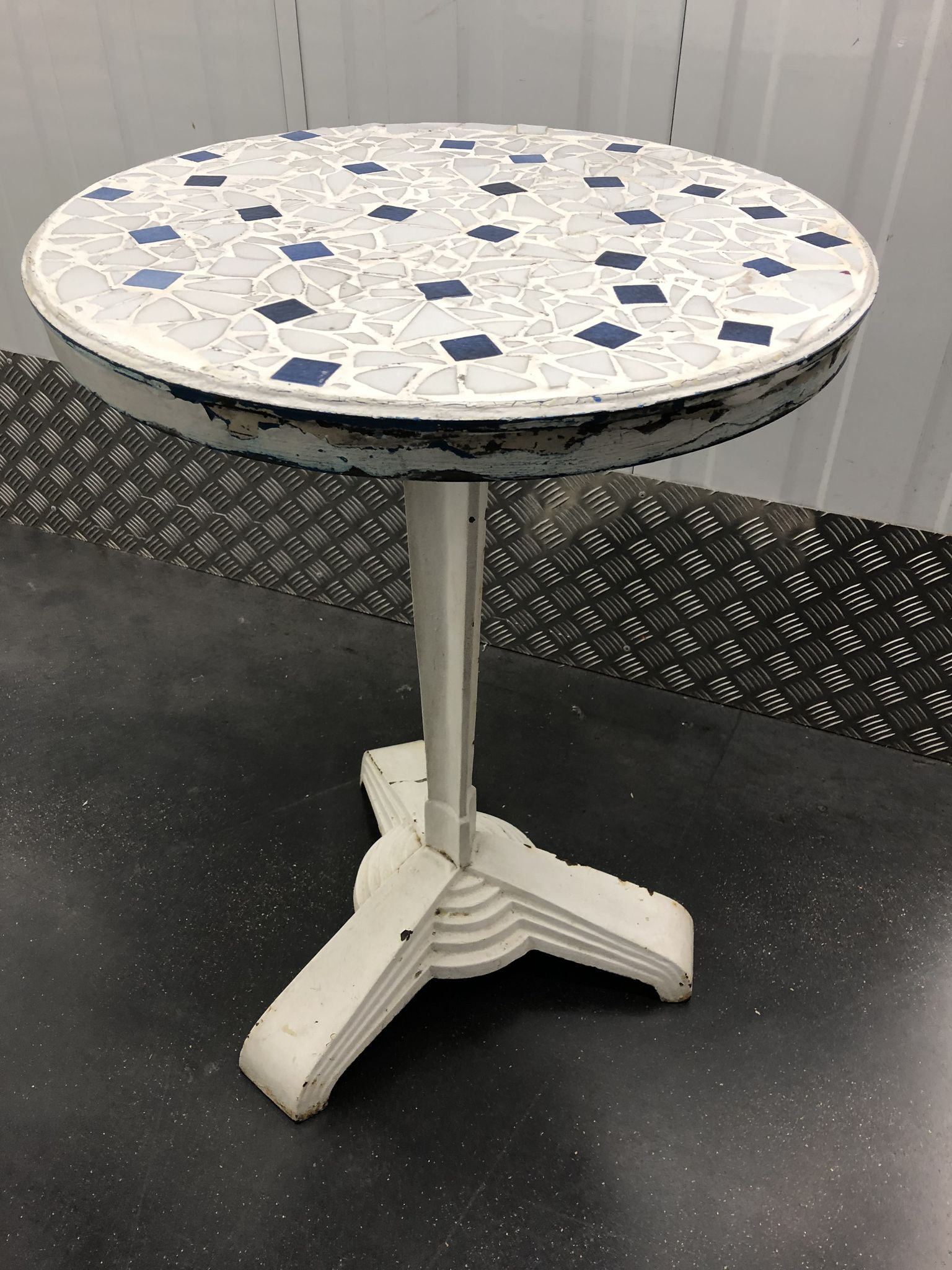 Art Deco cast garden table and porcelain shard tray