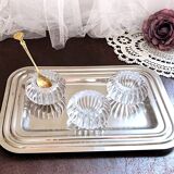 Trio of salt shakers, pepper shakers, molded glass salt shakers