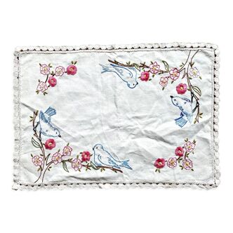 Antique embroidered placemat