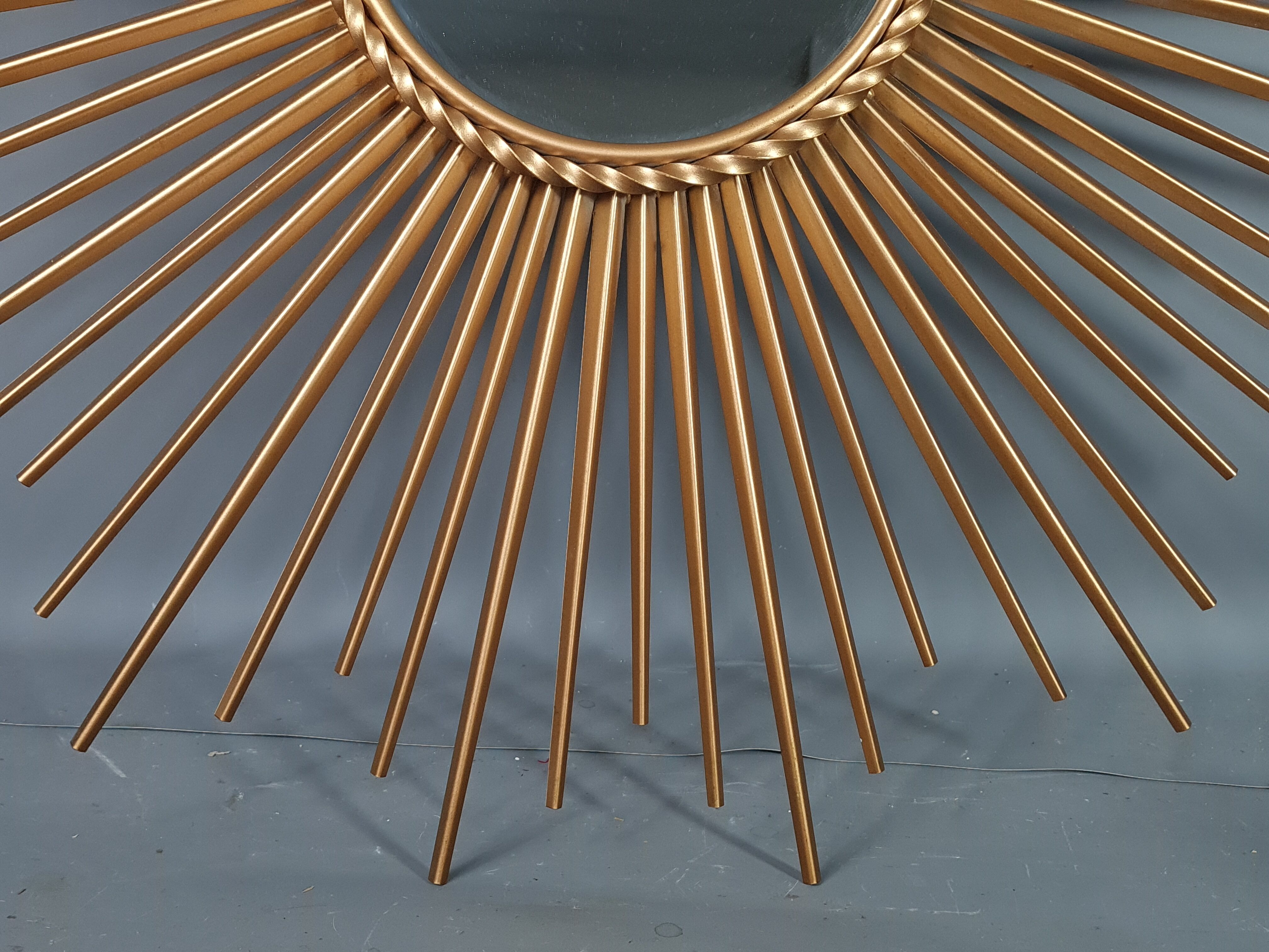 Miroir soleil Chaty à Vallauris métal doré 70 cm SB