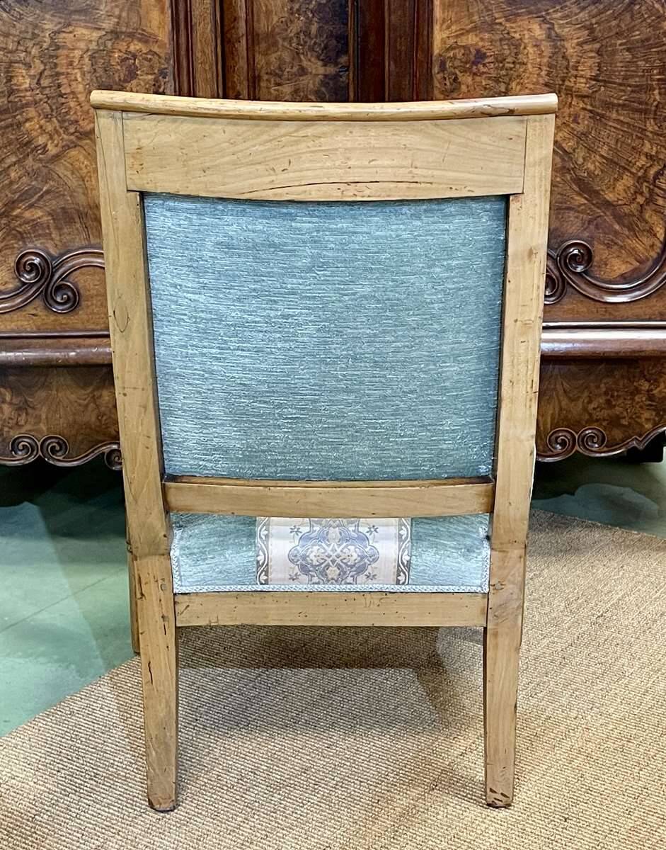 Restoration period armchair in 19th century cherry