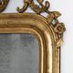 Louis-Philippe mirror from the 19th century with foliage and grape cluster motifs.