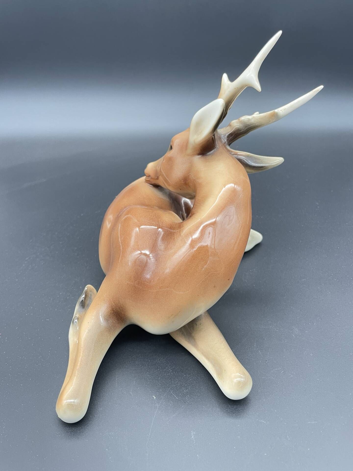Royal Dux porcelain lying deer – Vintage Bohemian sculpture, mod