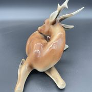 Royal Dux porcelain lying deer – Vintage Bohemian sculpture, model