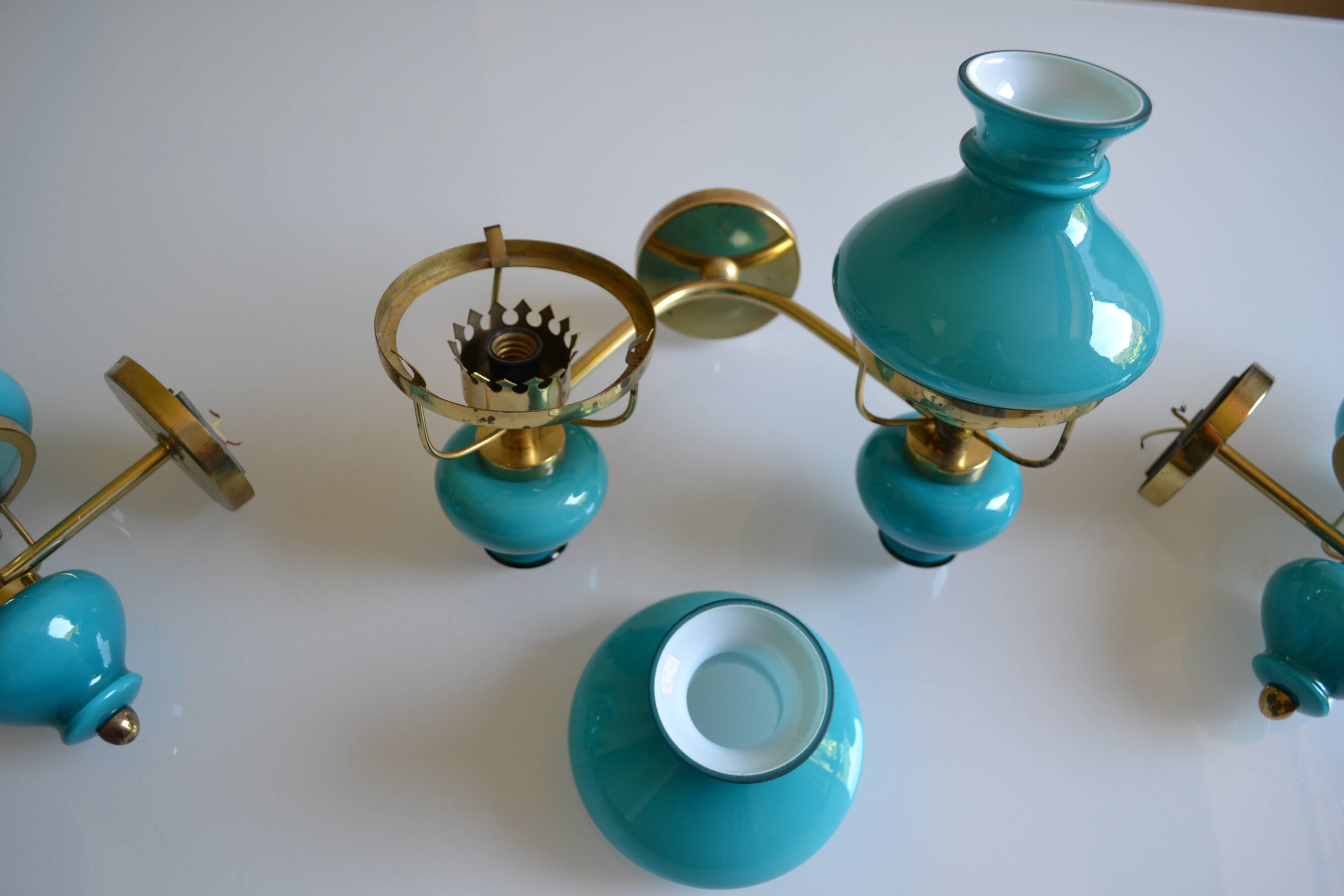 Series of 3 vintage brass and blue opaline wall lamps