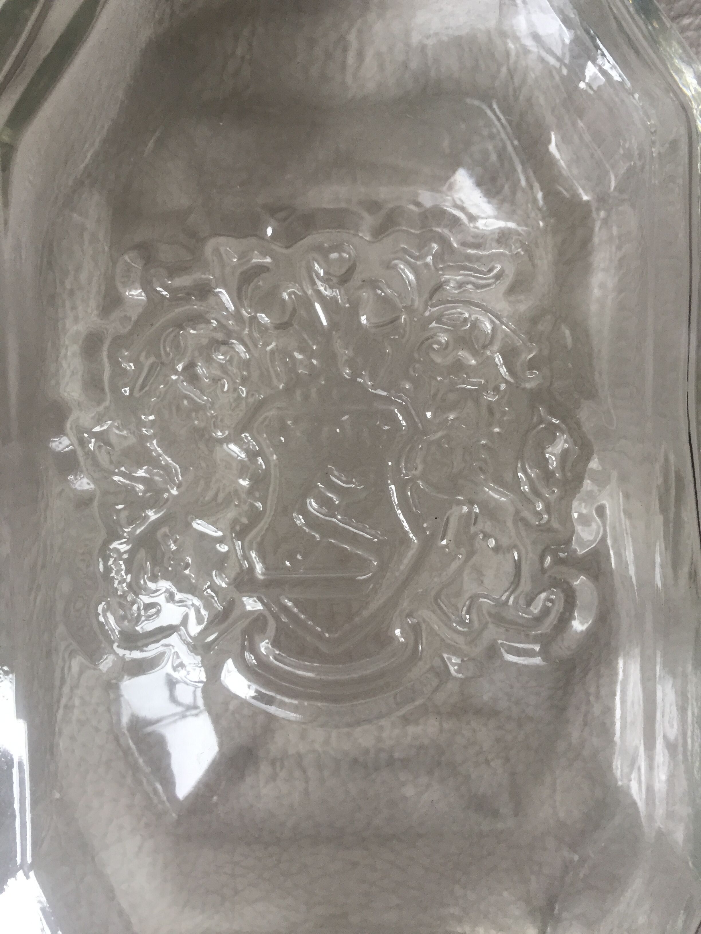 Glass bottle with coat of arms