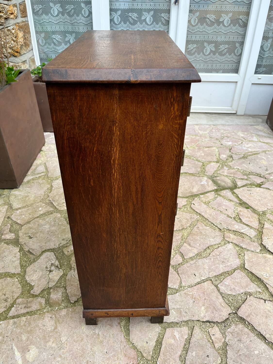 Low carved wooden sideboard