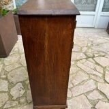 Low carved wooden sideboard