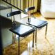 Pair of vintage Italian made dining chairs in chromed metal and black leather