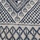 Traditional white and blue hand-woven wool carpet