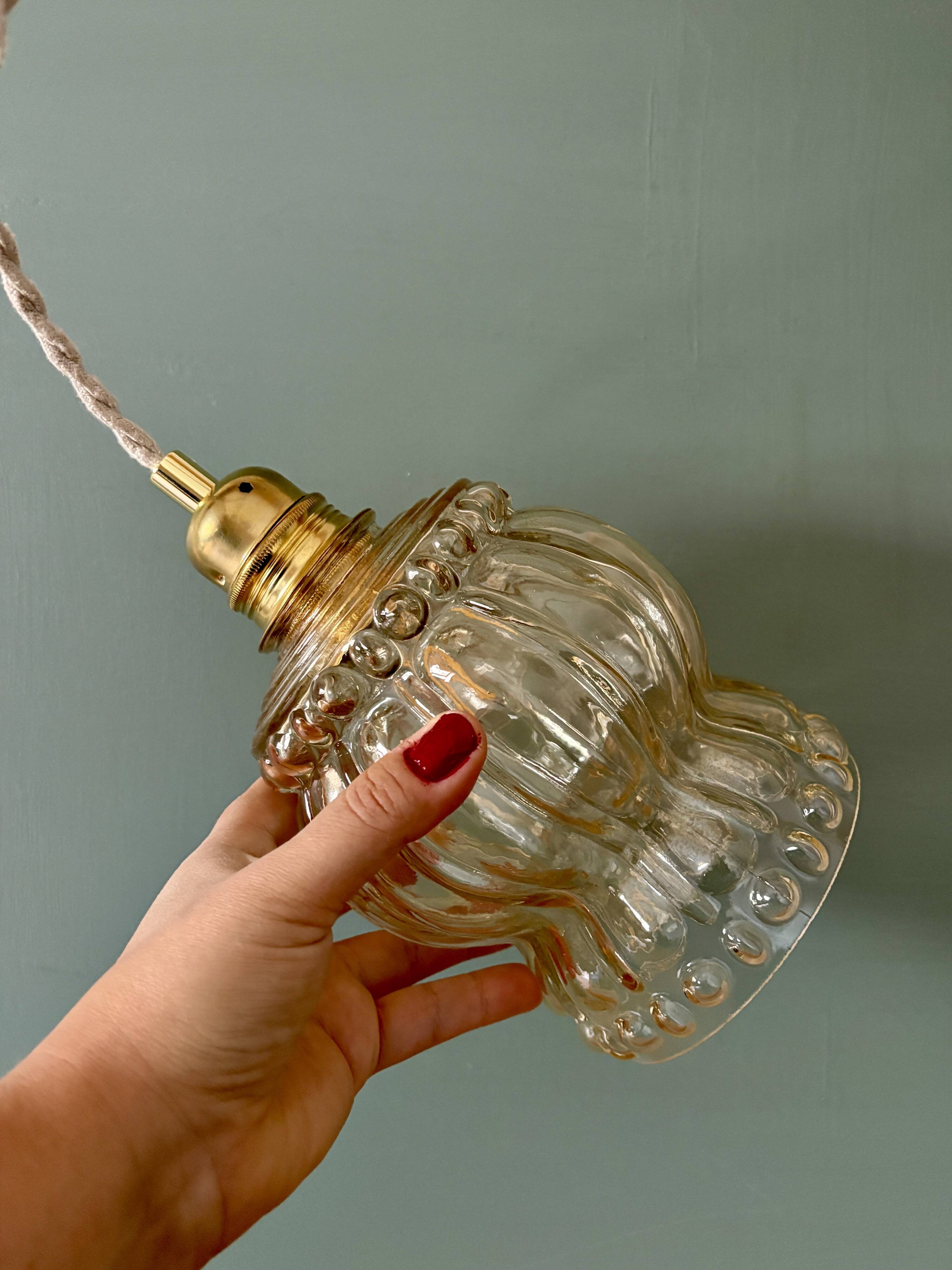 Vintage amber glass suspension globe