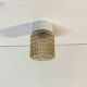 Old wall light in amber glass and plastic fixing base 1970
