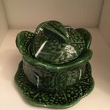 1 small bowl of cabbage with its plate underneath