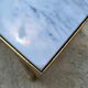 Hollywood Regency style coffee table • marble and brass