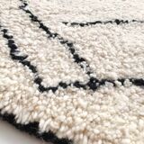 Berber rug Beni Ouarain with black graphic patterns 301x193cm