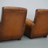 Paire de fauteuils club vintage en cuir cognac français, lot de 2
