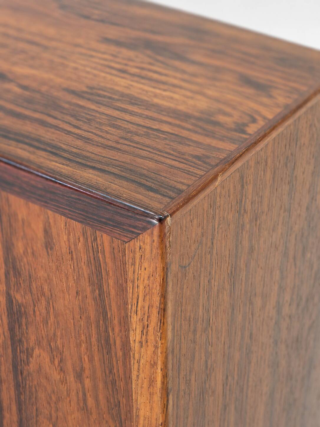 Low sideboard in rosewood with sliding doors. Denmark, 1960s
