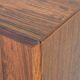 Low sideboard in rosewood with sliding doors. Denmark, 1960s