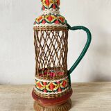 Vintage wicker and scoubidou carafe