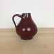 Vase en céramique rouge avec anse