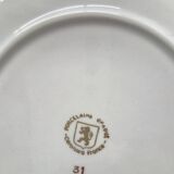 Set of 5 small flowered deep plates.