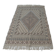 Traditional handmade Berber carpet in brown and beige wool.