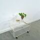 Space age plexiglas trolley met messing