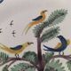 Antique hand-painted earthenware plate – piper and birds